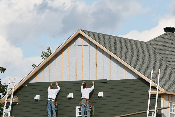 Professional Siding Repair technician working in West Columbia, TX